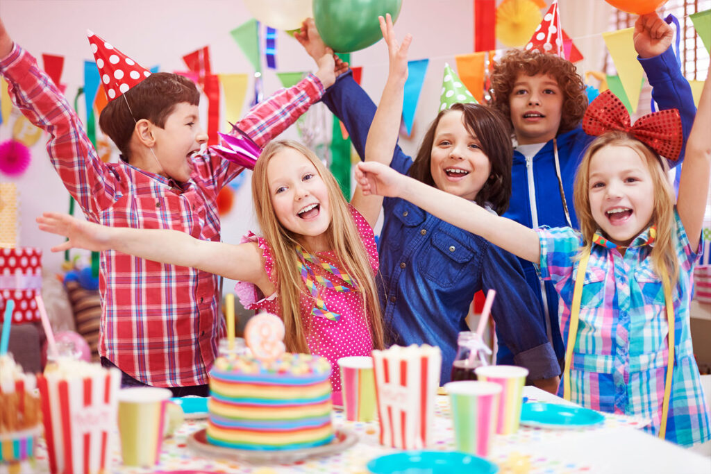 Beautifully decorated kids' party setup with themed decorations and colorful balloons, organized by Kids Day Events in Abu Dhabi